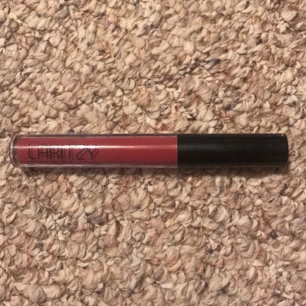 Laritzy lipgloss in shade Tidal. Never used